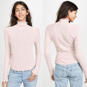 Free People light pink mock neck long sleeve shirt. Size Medium